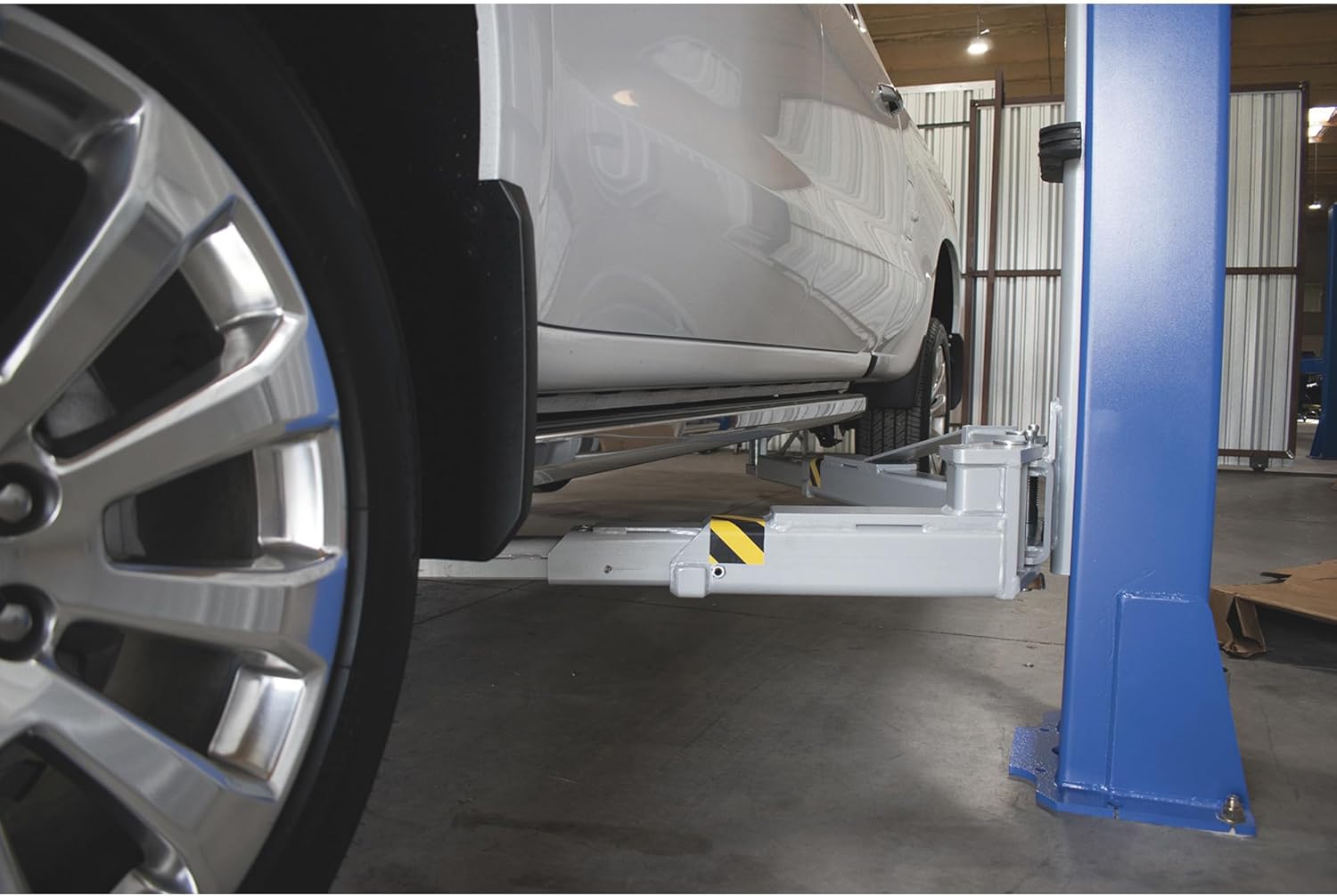 best two post car lift,should I buy a two post lift,two post lift vs scissor lift,two post car lift pros cons,best automotive lift for garage,two post lift worth buying performance testing and real-world results